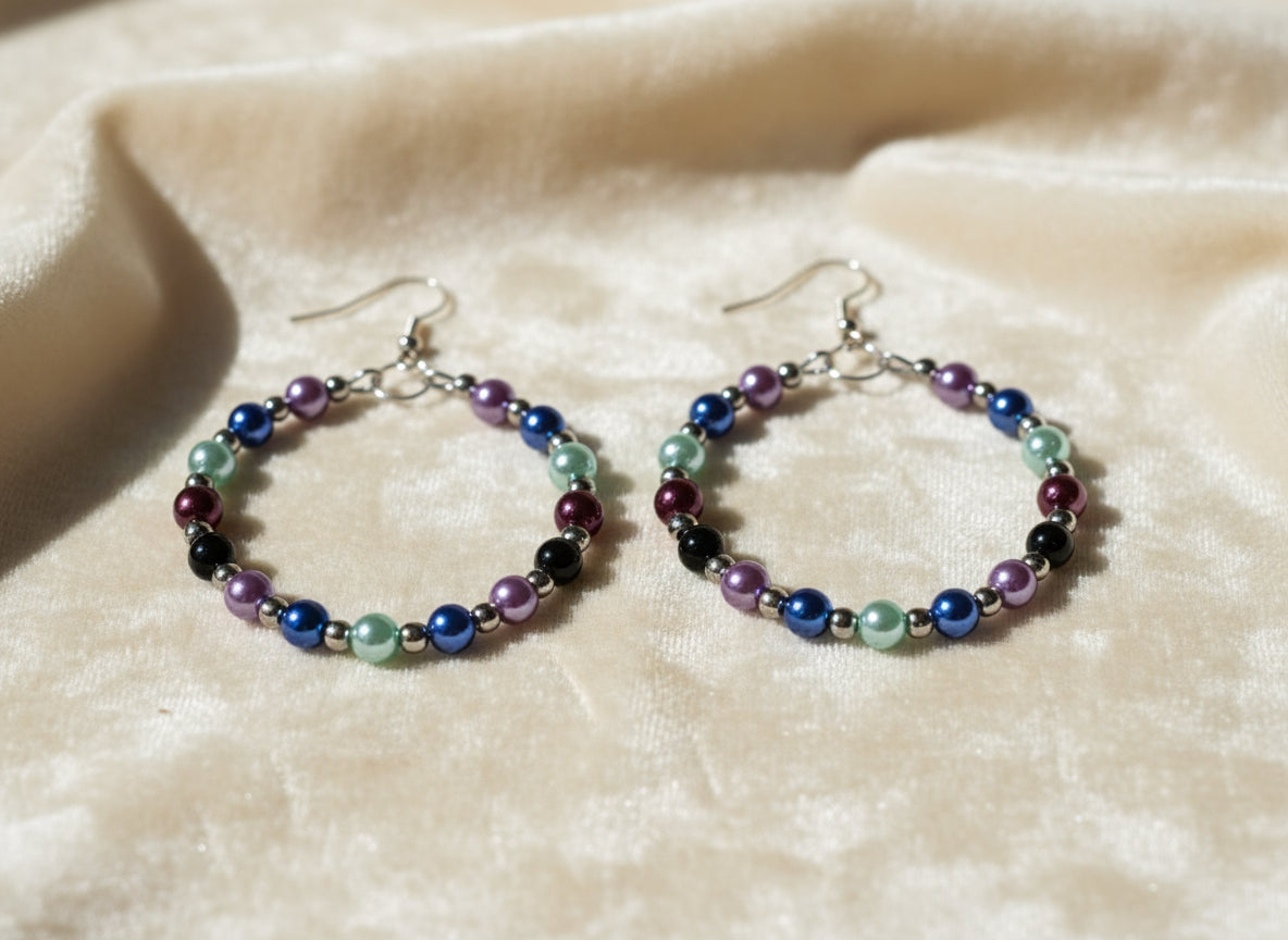Handmade aluminum wire hoop earrings with five colorful beads