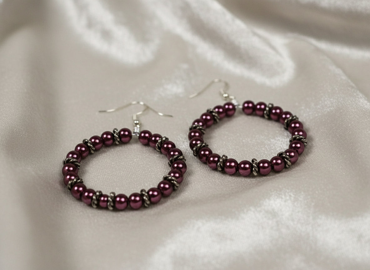 Pair of purple hoop earrings perfect for casual or dressy outfits