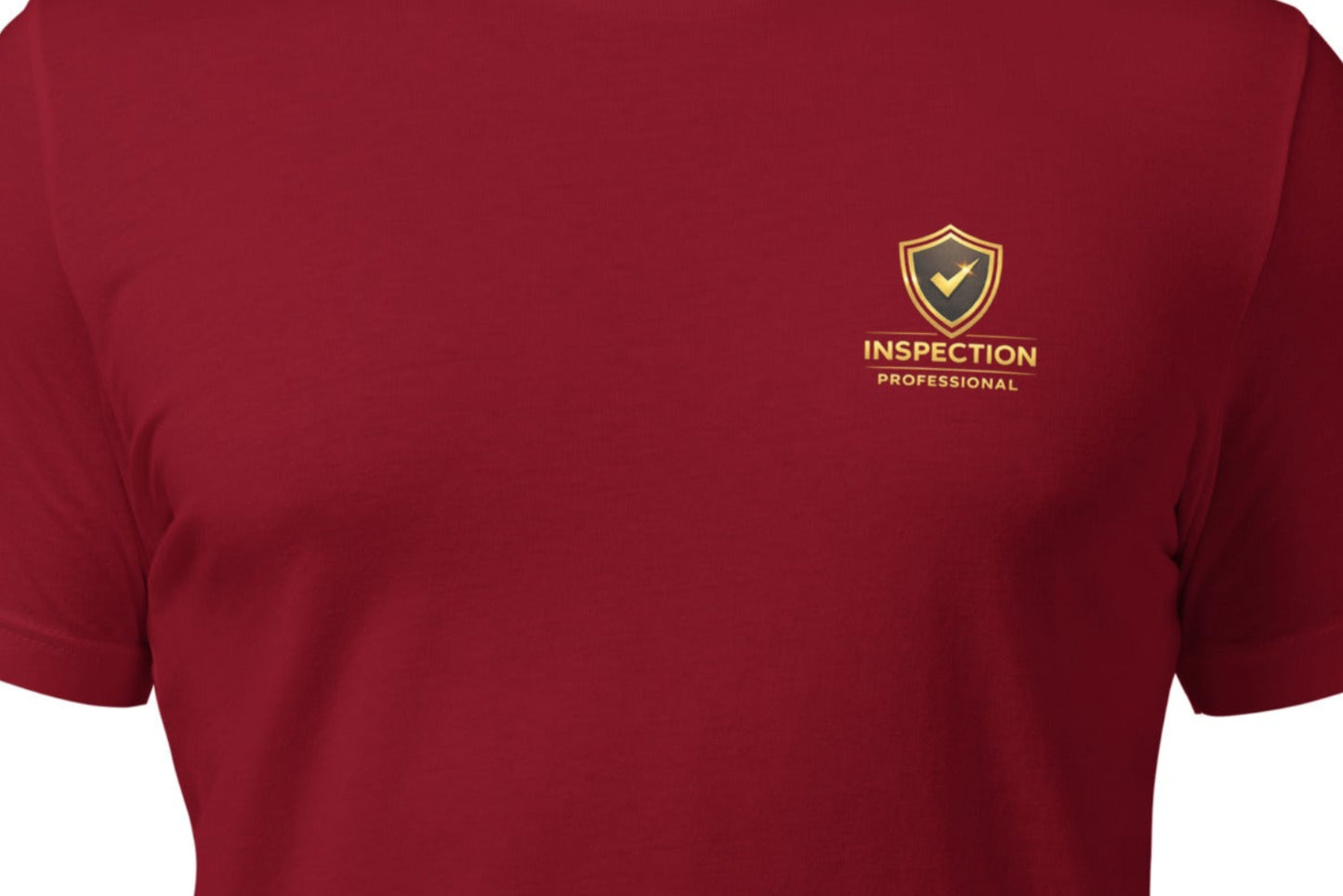 Close-up of the Inspection Professional logo printed on the Unisex Inspection Professional Shirt by Bella + Canvas 3001, highlighting the premium DTF print quality and design details.