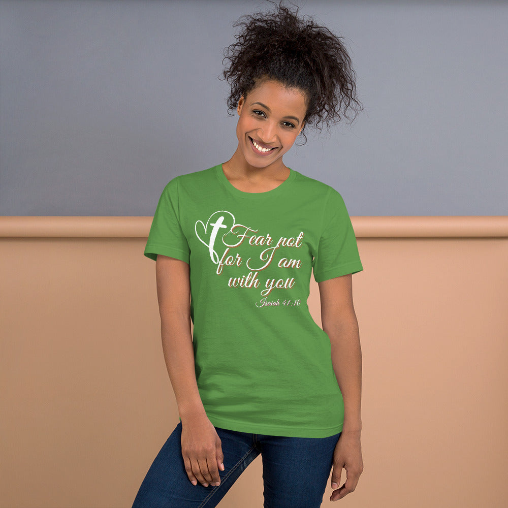 Woman wearing a green t-shirt with a motivational quote on a plain background
