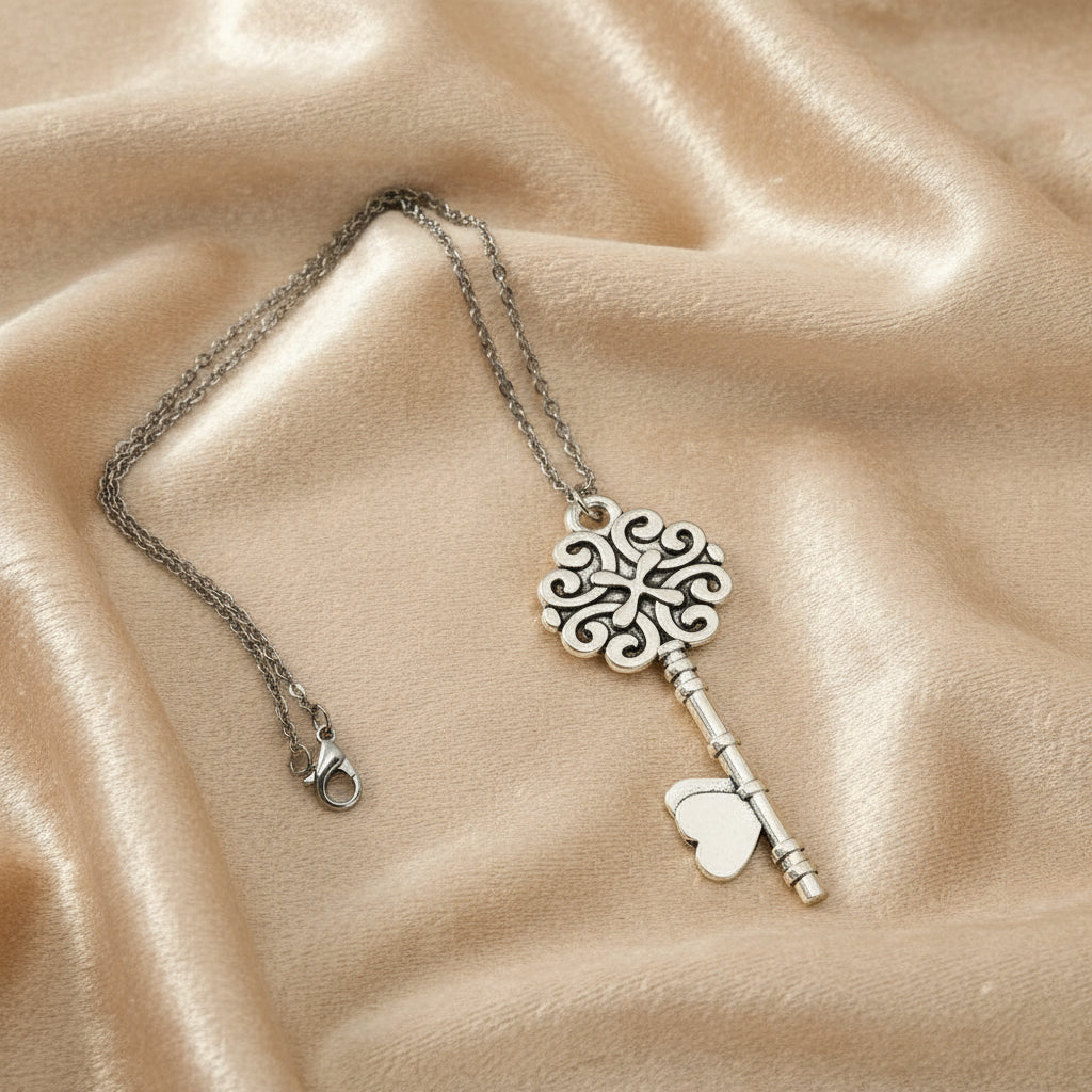 Tree of Life cabochon necklace lying on a soft cloth under natural light