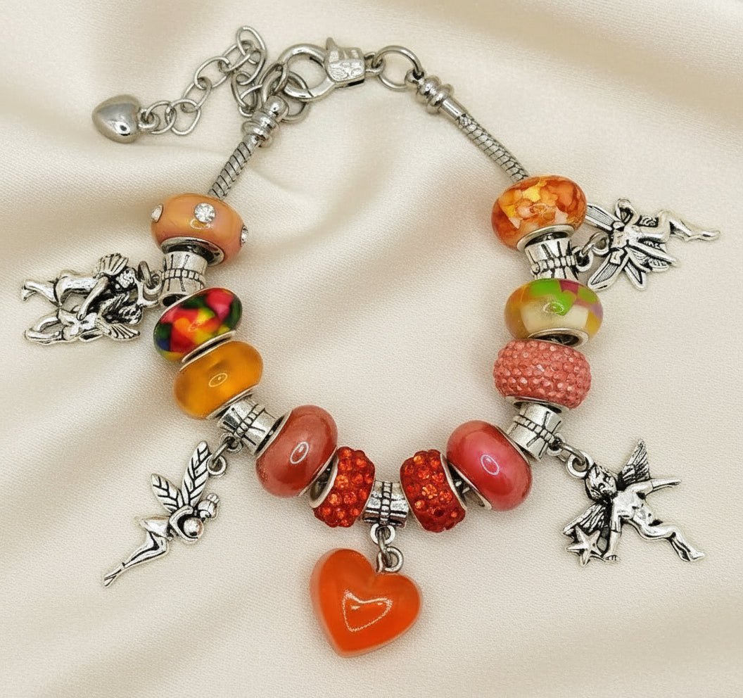 Colorful beaded bracelet with various charms on a beige background