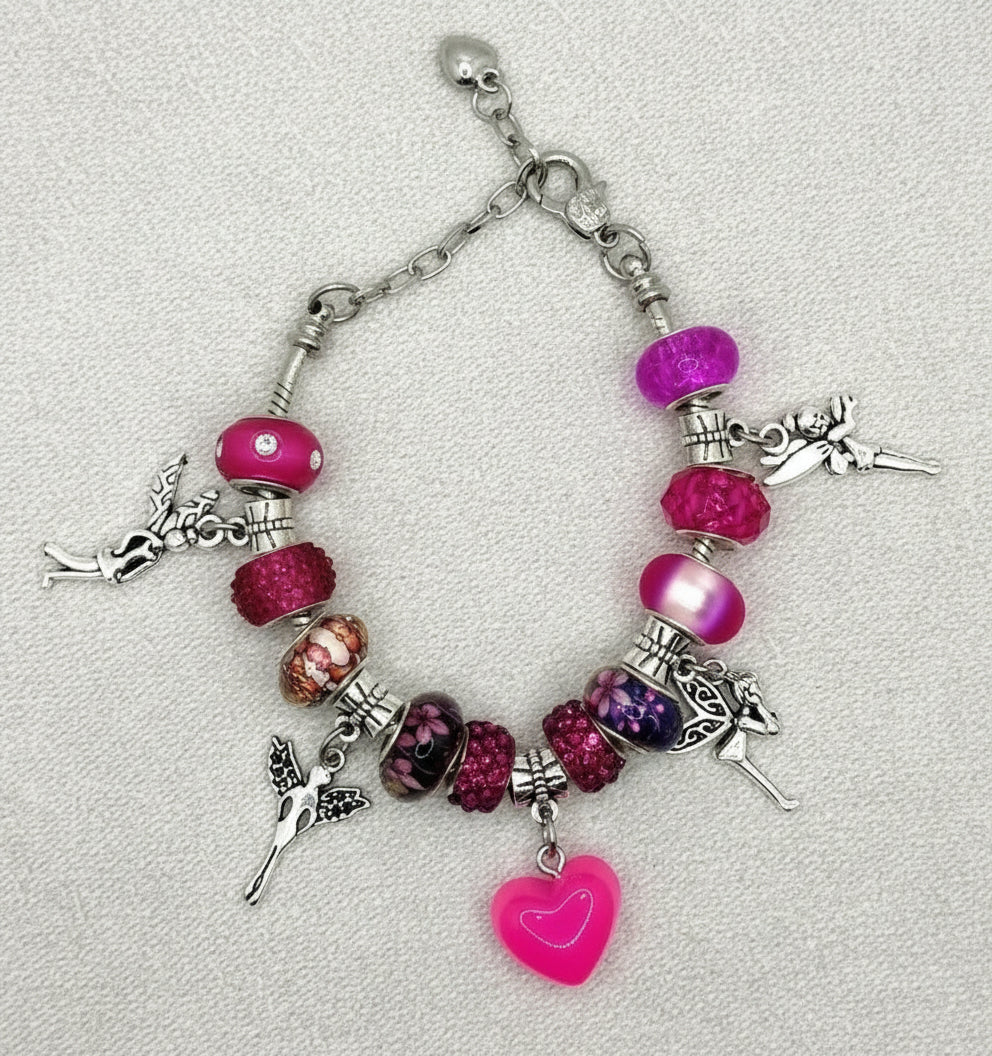 Bracelet with colorful beads and charms on a light gray background