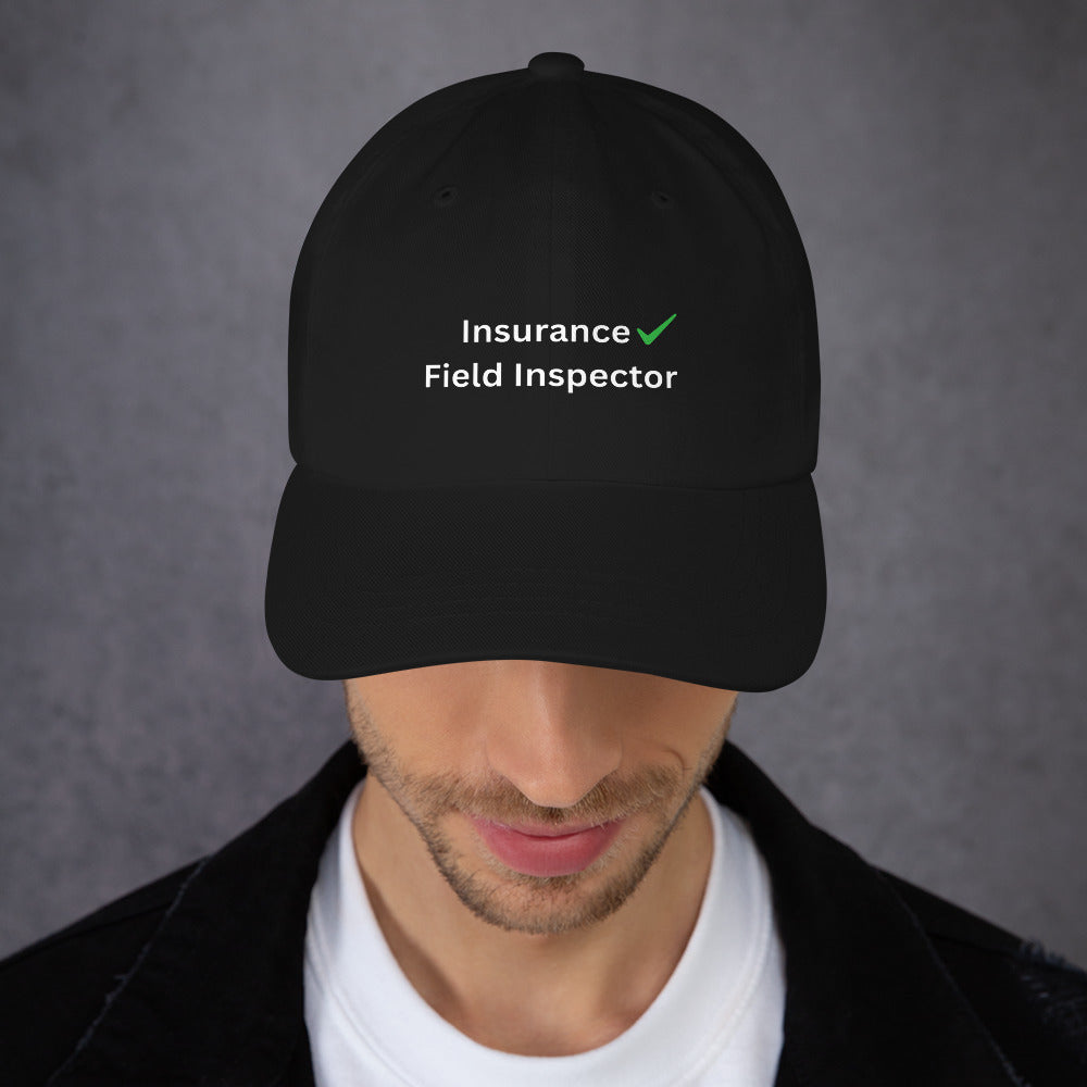 Black cap with 'Insurance Field Inspector' text on a gray background