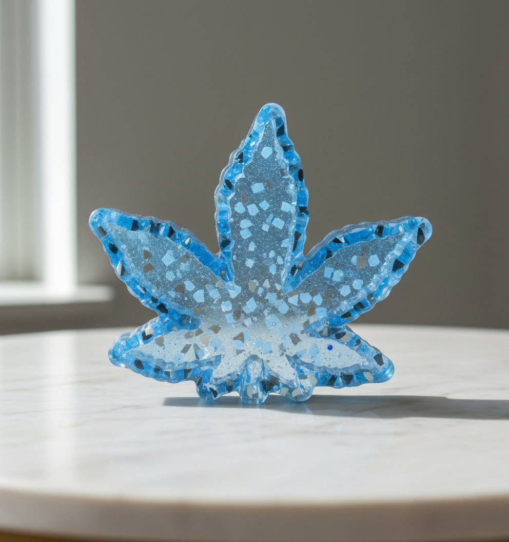 Blue and clear handmade leaf-shaped resin ashtray made from epoxy