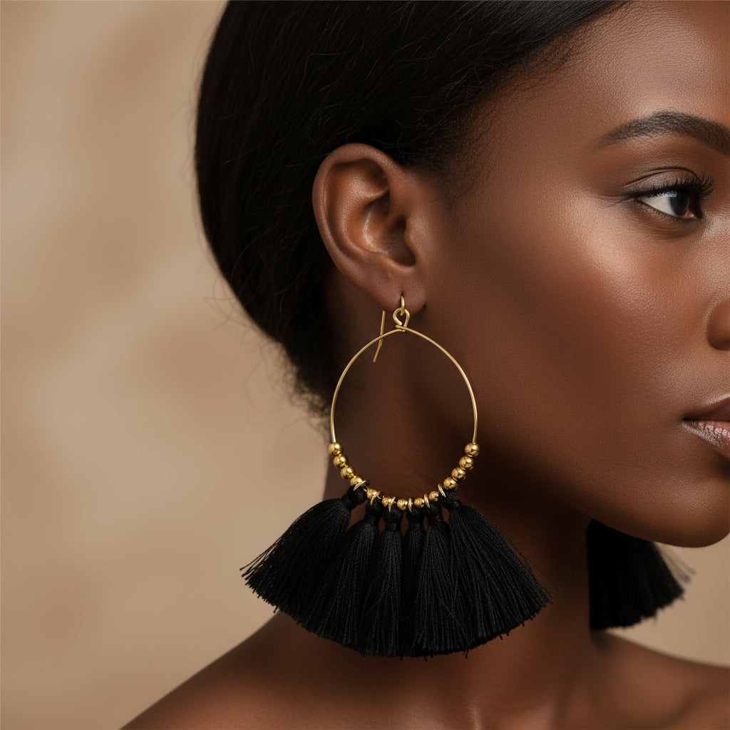 Handmade gold tassel hoop earrings with copper wire and golden seed beads