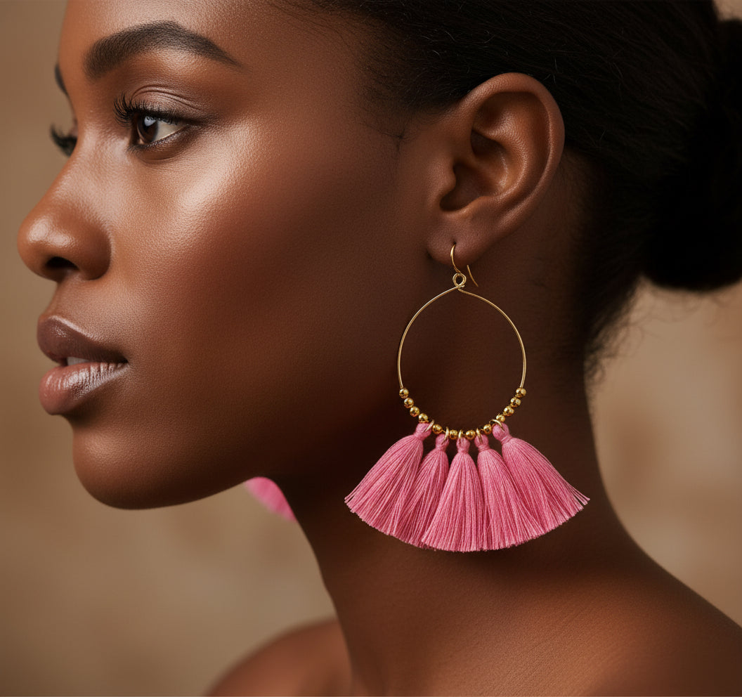 Handmade gold tassel hoop earrings with copper wire and golden seed beads