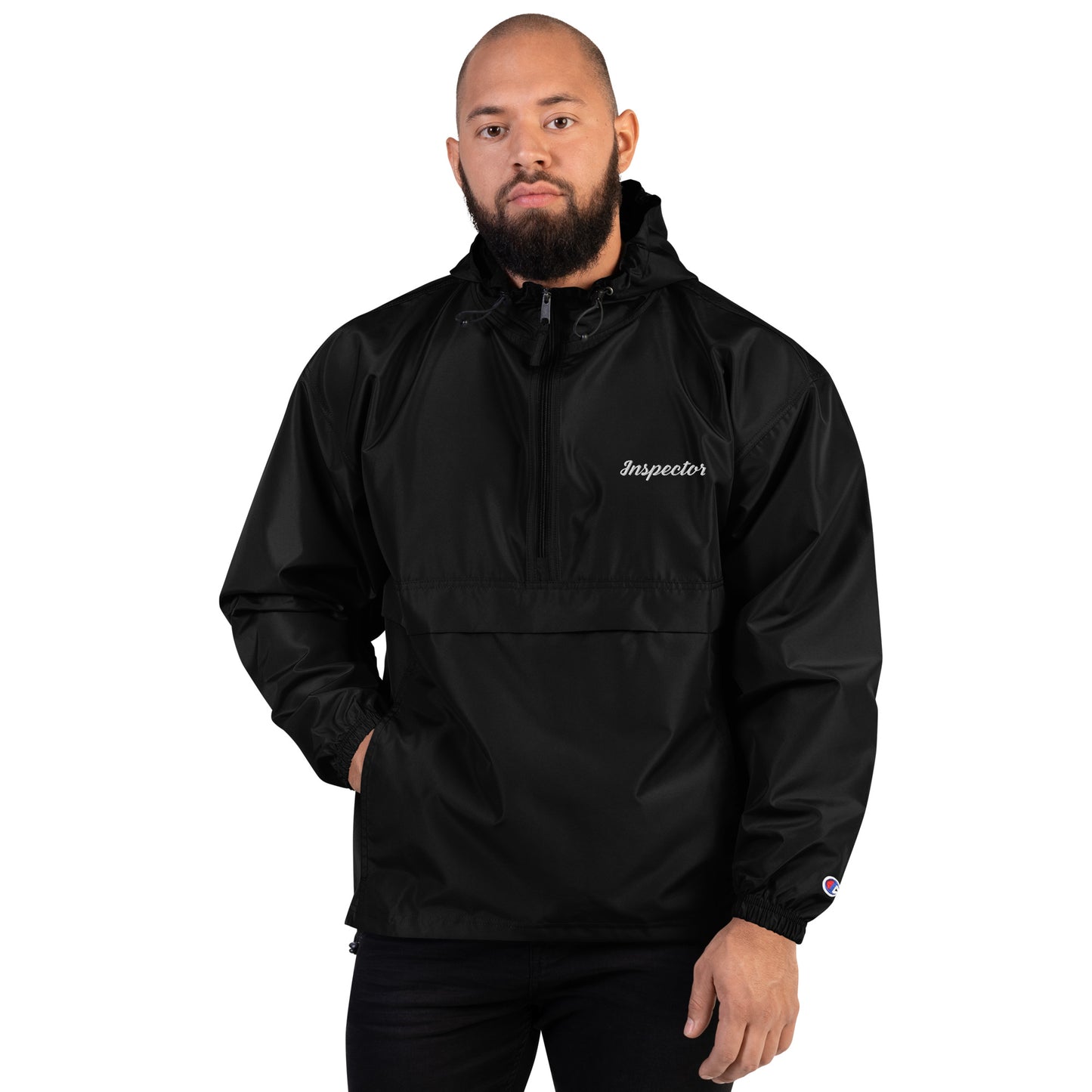Black Champion packable pullover jacket with embroidered Field Inspection logo