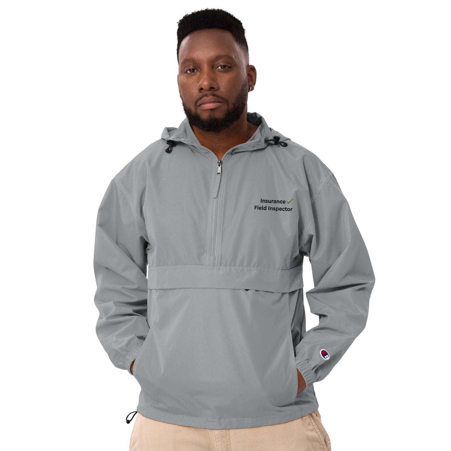 Graphite Champion packable windbreaker jacket for field inspectors with embroidered design