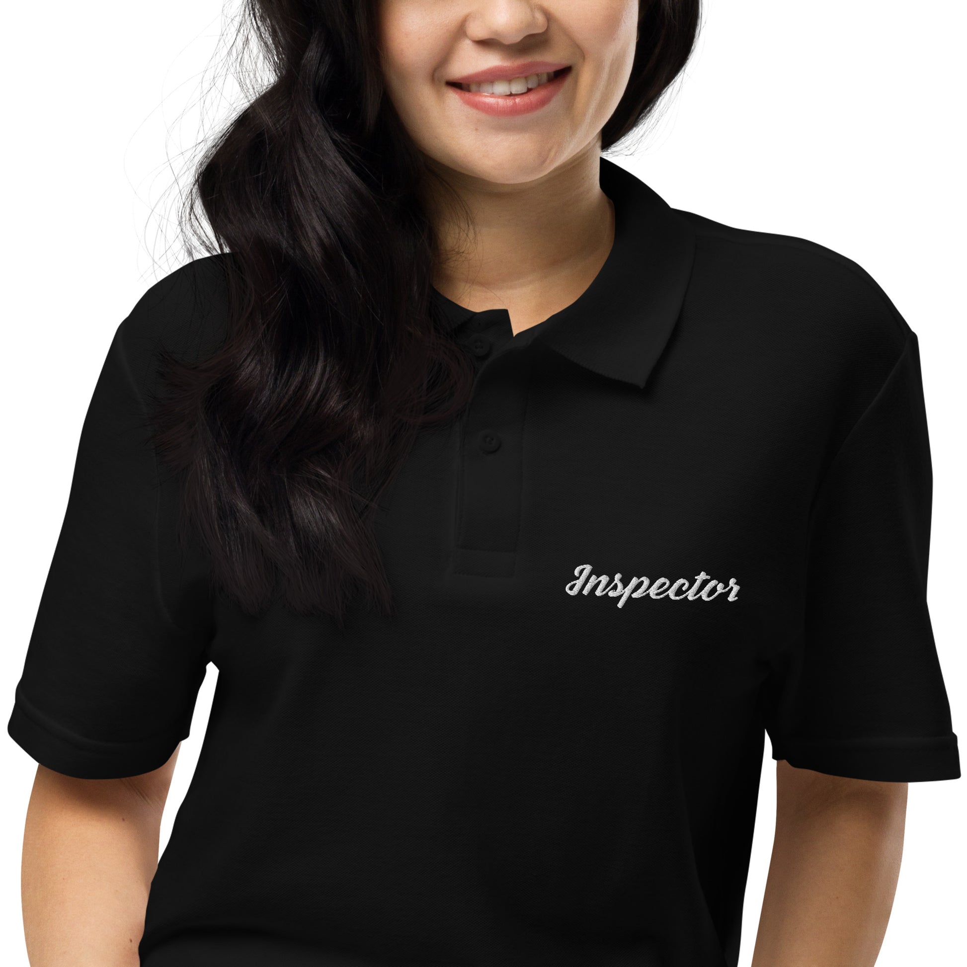 Close-up of black field inspector polo shirt showing professional Inspector chest design for insurance and property inspections.