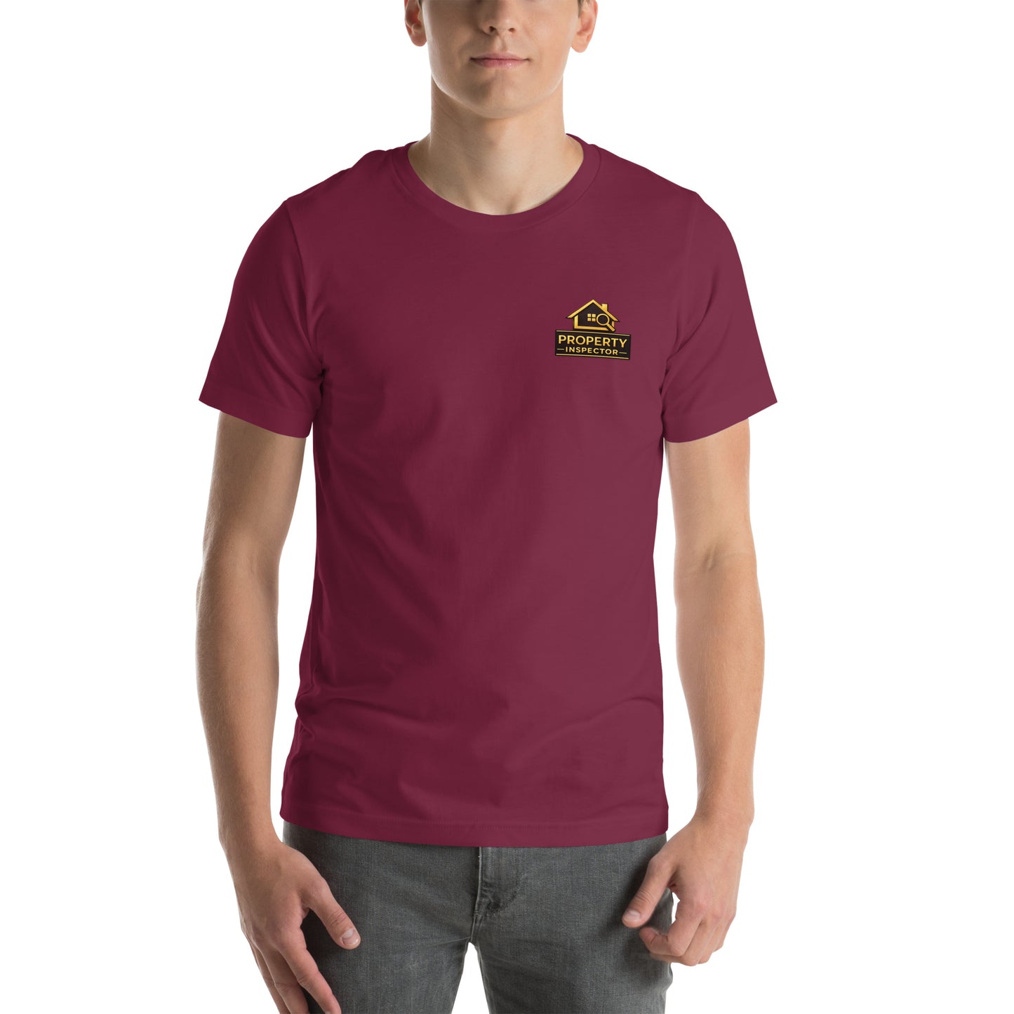 Property inspector standing outdoors wearing maroon Unisex Property Inspector Bella + Canvas 3001 work shirt.