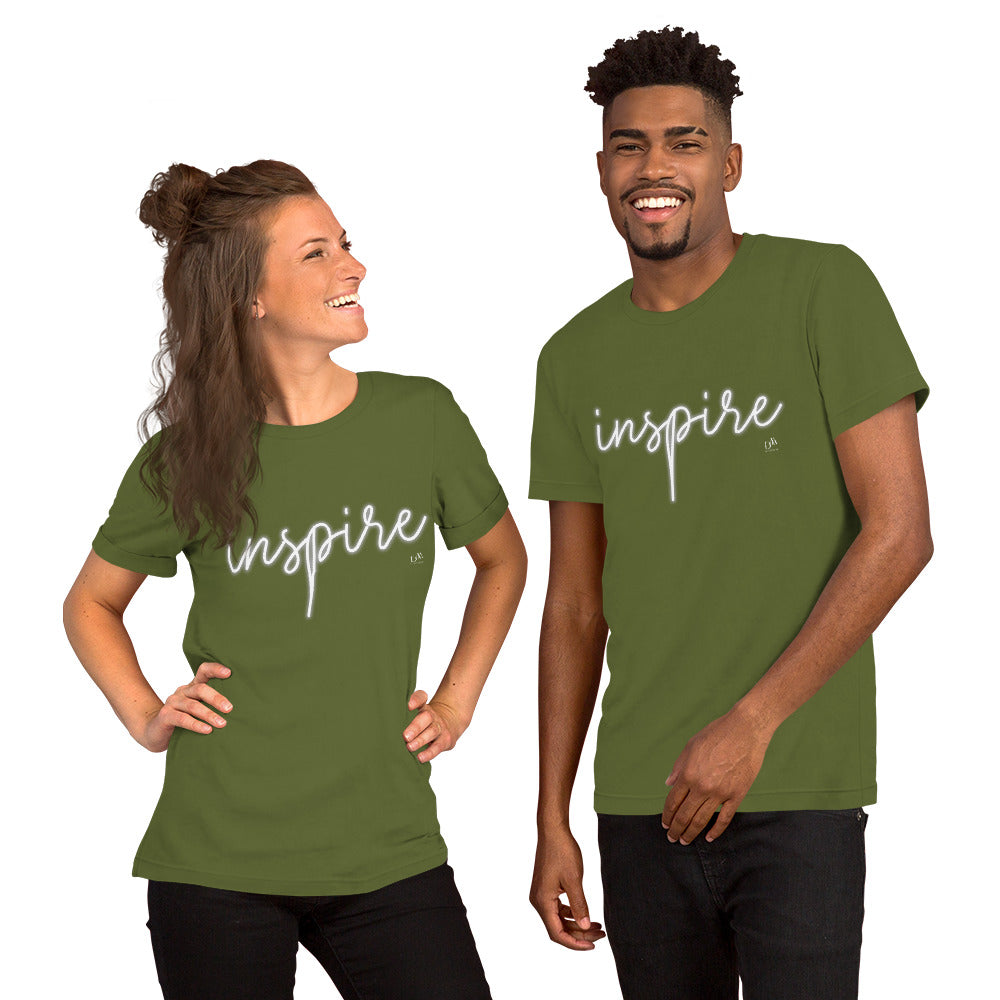 Two people wearing green t-shirts with 'inspire' text on a white background