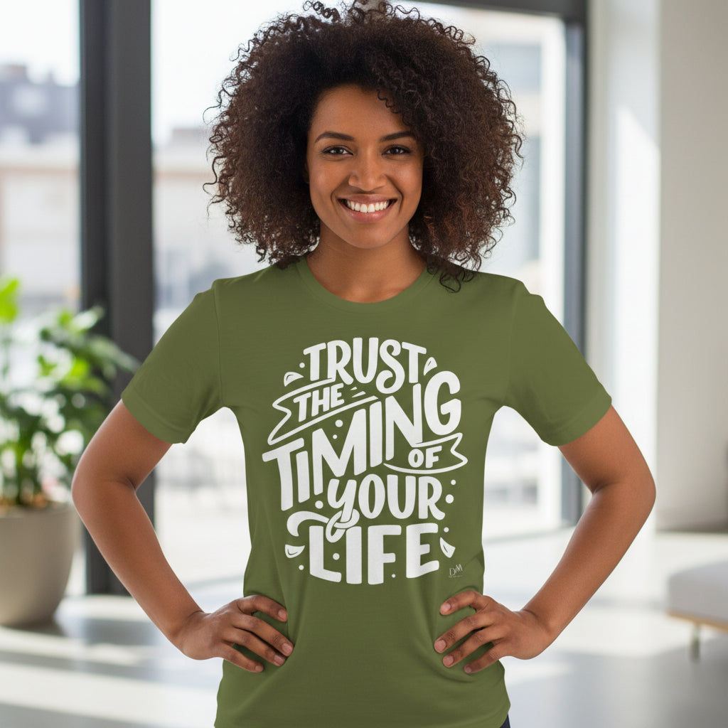 Woman wearing a green t-shirt with a motivational quote indoors