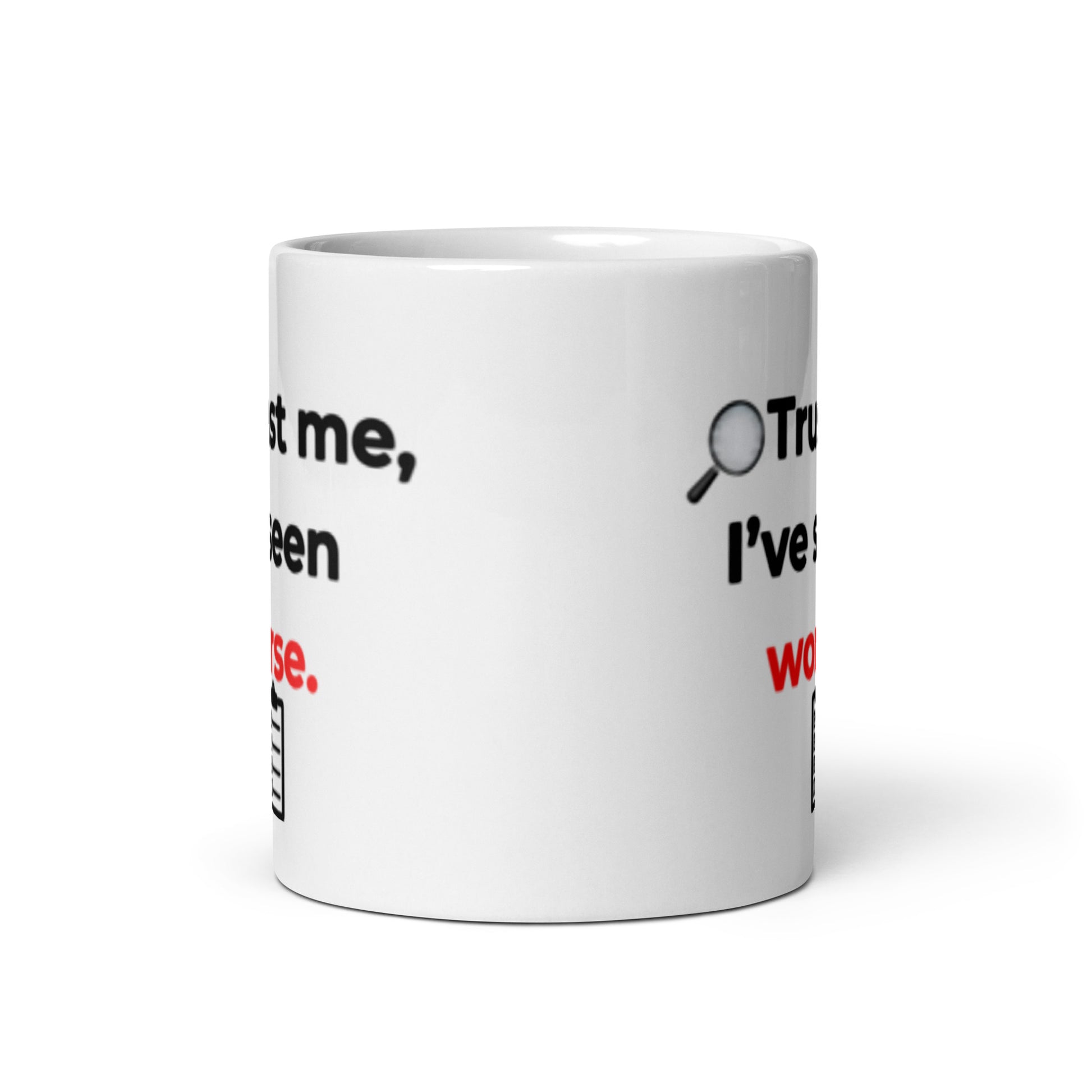 Side angle of white glossy ceramic mug with inspector humor quote