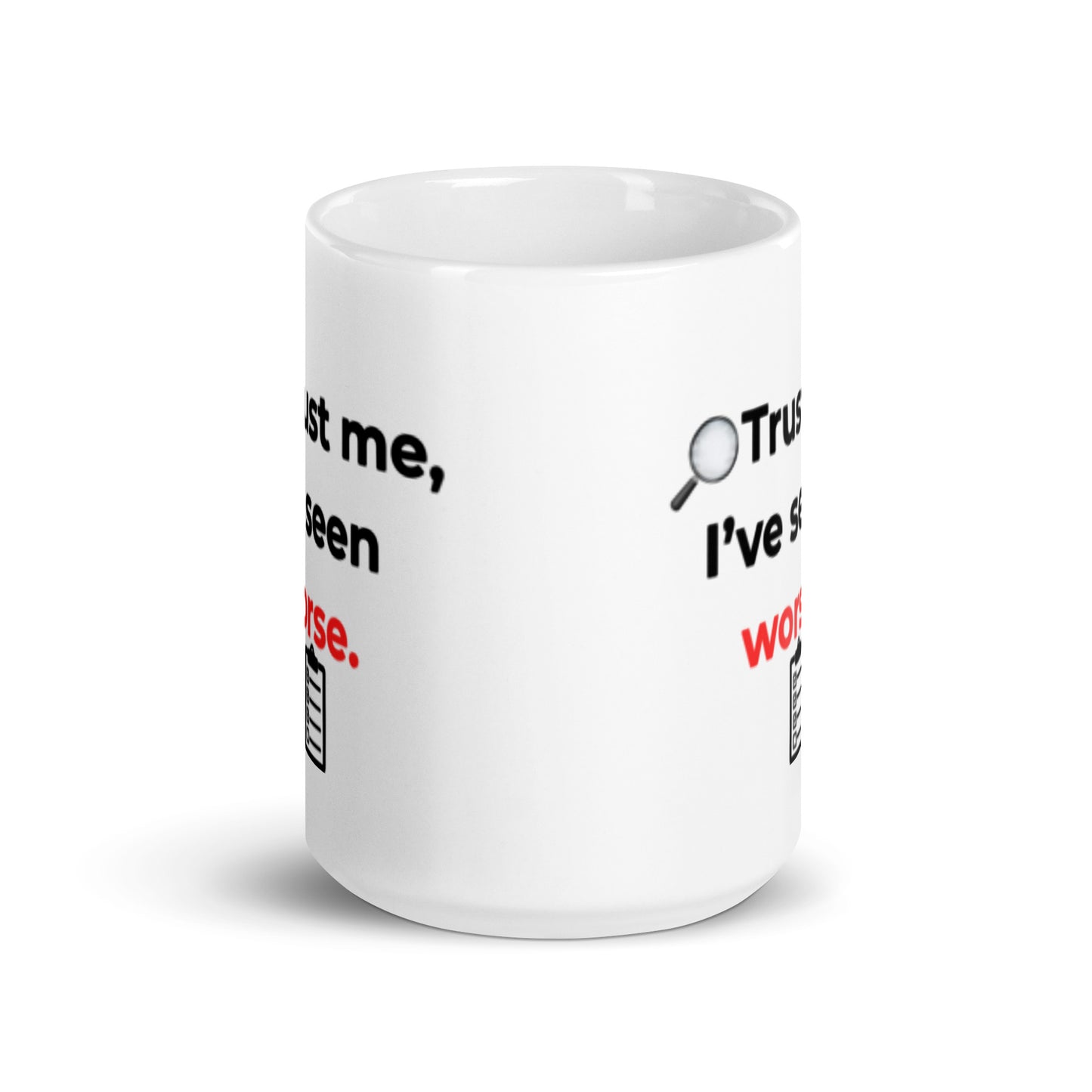 Side angle of white glossy ceramic mug with inspector humor quote