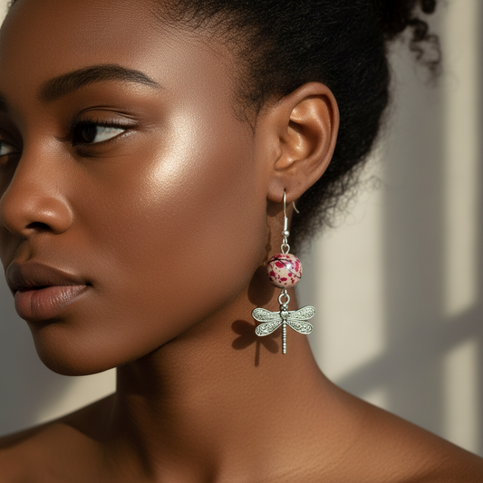 Woman wearing oriental dragonfly beaded earrings with antique silver and glass beads