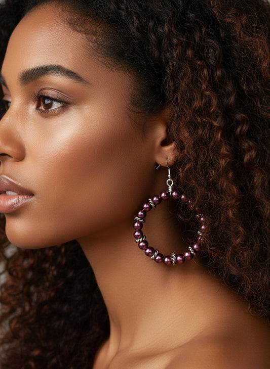 Close-up of non-tarnish aluminum purple hoop earrings