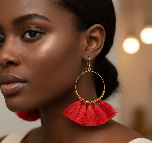 Handmade gold tassel hoop earrings with copper wire and golden seed beads